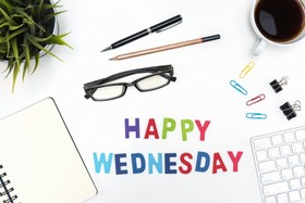 Office desk table with happy Wednesday! A cup of coffee. Glasses. Notebook. Paper clip. Office supplies. Free Download 2024 greeting card