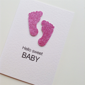 Hello, sweet baby! Foot. Steps. Pink color. Glue, glitter, pink and white construction paper. Free Download 2023 greeting card