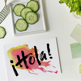 Hola! Green pickle. Red background. A picture in the kitchen. Free Download 2023 greeting card