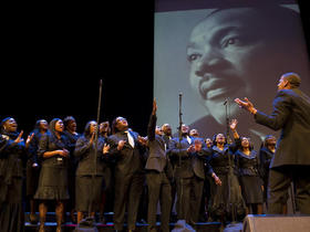 Ecard of the many people. Martin Luther King and a lot of people on stage. Free Download 2025 greeting card