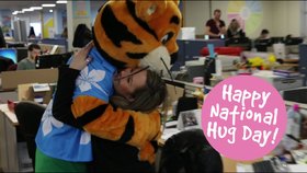 National Hug Day. Ecard for you... Tiger... Man... Embrace... Hugs... Love... Have a nice day. With best regards. Free Download 2025 greeting card