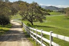 Road to the mountains. Nature art-ecard. A postcard with a nice little village. Beautiful view. White fence. Narrow path. The mountains. Free Download 2024 greeting card
