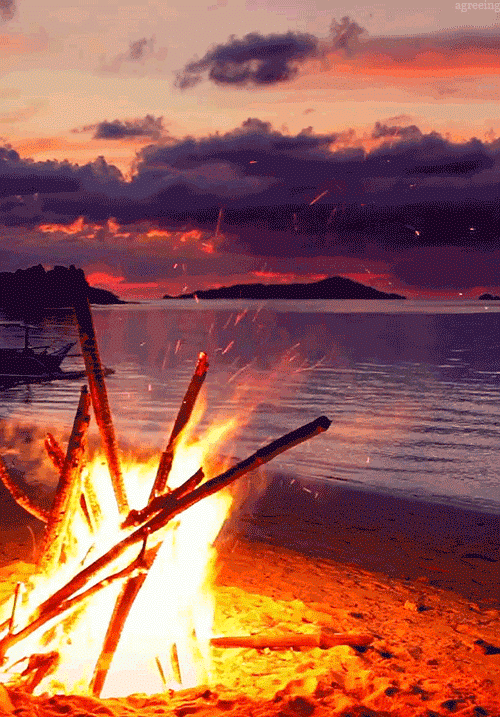 Bonfire on the beach. Nature gif card. Greeting card with twilight on the beach. Sandy shore. Beautiful sunset. Bonfire on the beach. A cozy evening. Cool atmosphere. Free Download 2024 greeting card